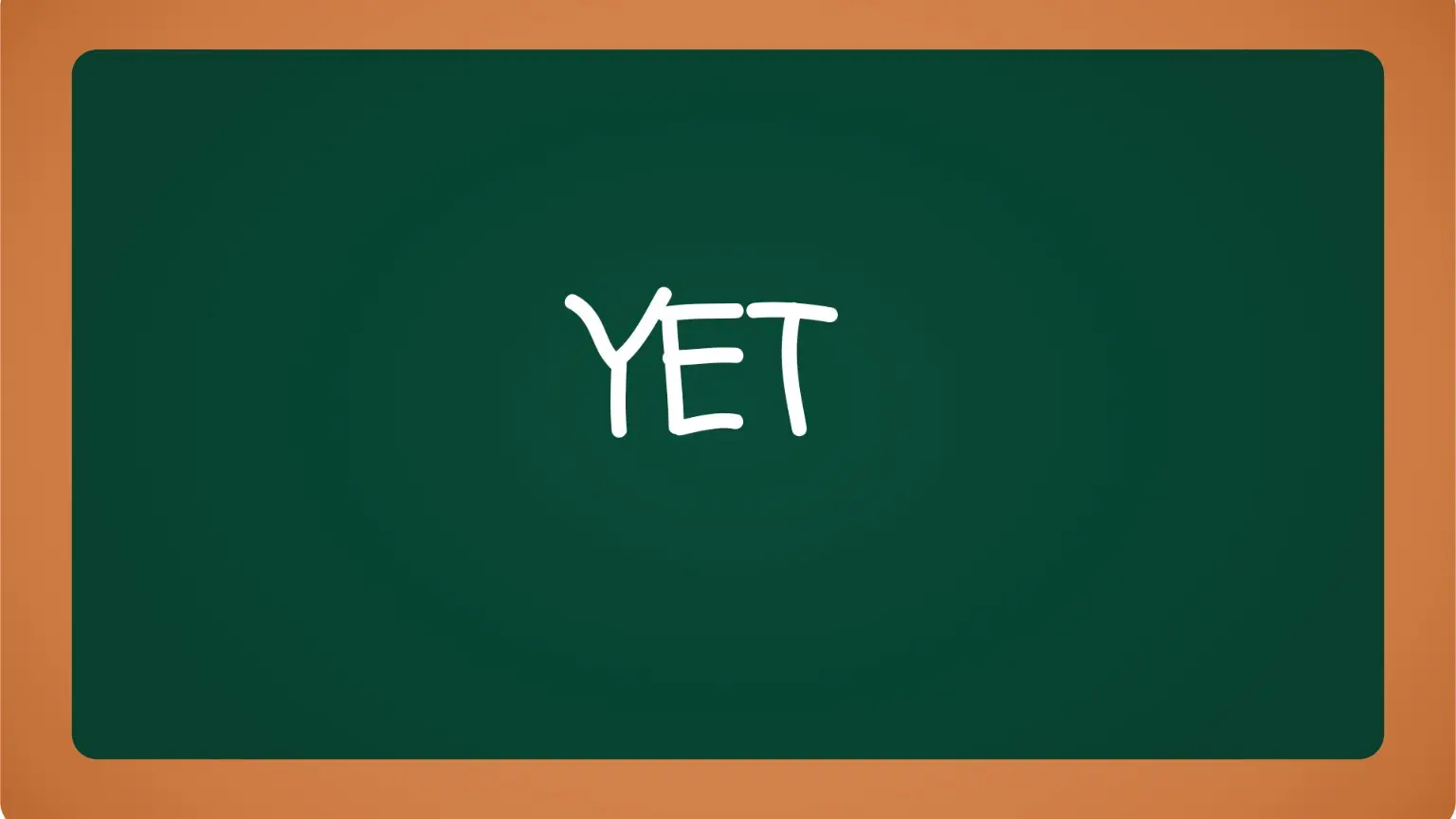A chalkboard with ‘Yet’ in bold letters, symbolizing untapped potential.