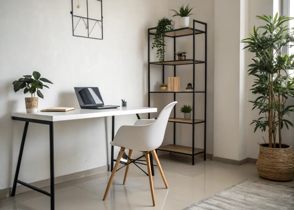 A wide shot of a minimalist office with a sleek desk, one shelf, and a single plant