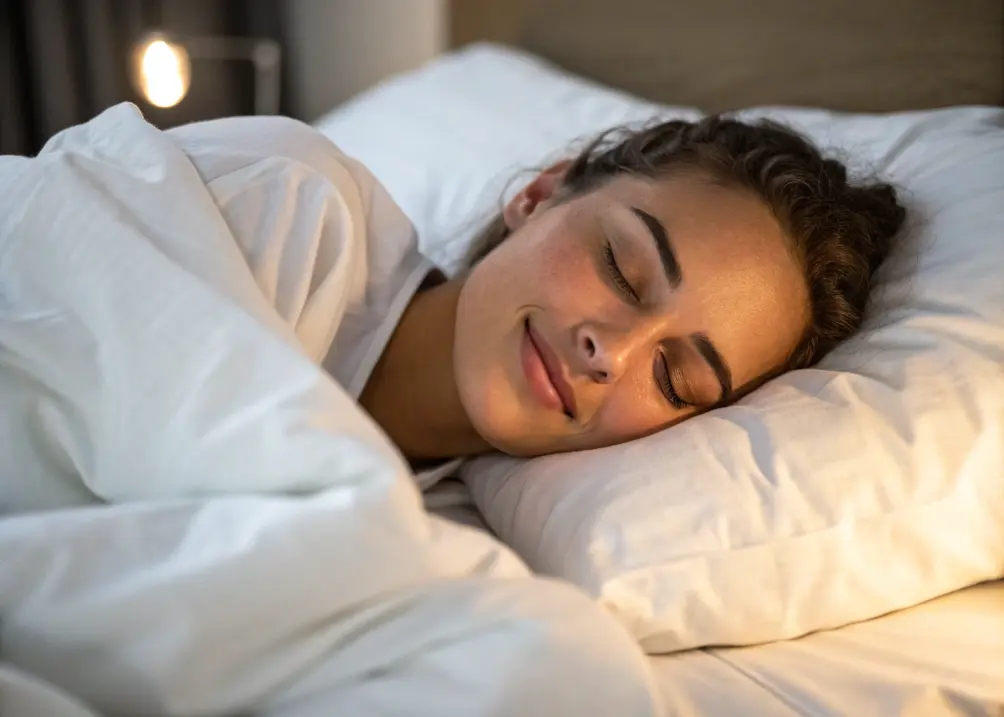 woman sleeping to allow skin repair and reduce stress