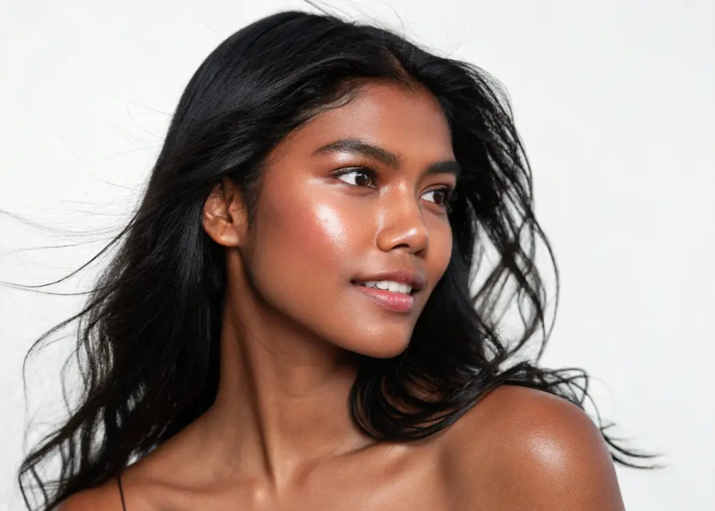 Brown-skinned woman with shiny jet black hair.
